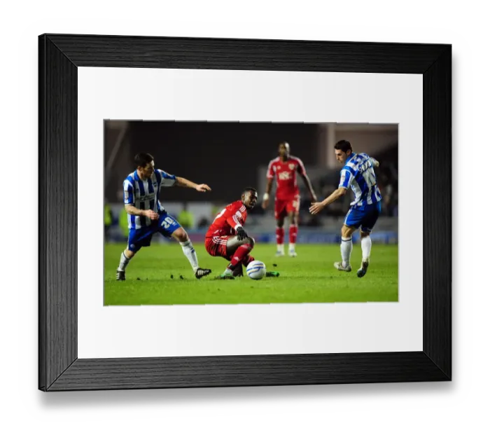Framed Print : Battling for Supremacy: Yannick Bolasie vs. Romain Vincelot and Matthew Sparrow in the Championship Clash between Brighton and Bristol City - 14 / 01 / 2012 Framed Print : Battling for Supremacy: Yannick Bolasie vs. Romain Vincelot and Matthew Sparrow in the Championship Clash between Brighton and Bristol City - 14 / 01 / 2012
