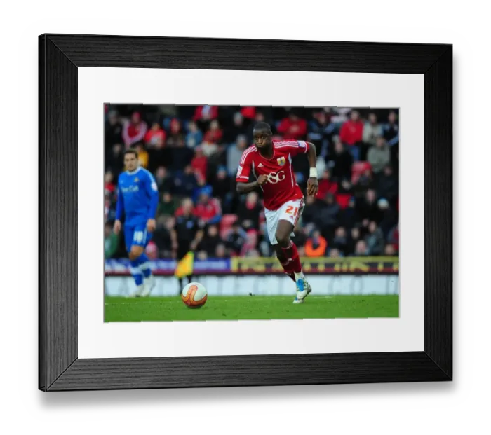 Framed Print : Bristol City's Kalifa Cisse in Action against Doncaster Rovers, Championship Match, 21st January 2012 Framed Print : Bristol City's Kalifa Cisse in Action against Doncaster Rovers, Championship Match, 21st January 2012