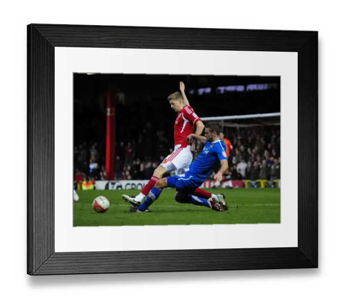 Framed Print : Bristol City's Jon Stead Fouled by Doncaster's Tommy Spurr - Championship Match, 21st January 2012 Framed Print : Bristol City's Jon Stead Fouled by Doncaster's Tommy Spurr - Championship Match, 21st January 2012