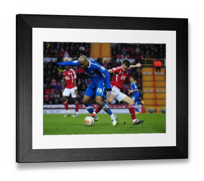 Framed Print : A Battle for the Ball: Neil Kilkenny vs El-Hadji Diouf - Championship Showdown at Ashton Gate (21 / 01 / 2012) Framed Print : A Battle for the Ball: Neil Kilkenny vs El-Hadji Diouf - Championship Showdown at Ashton Gate (21 / 01 / 2012)