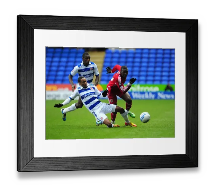 Framed Print : Bolasie Fouled by Cummings: Reading vs. Bristol City, Championship Match, 28 / 01 / 2012 Framed Print : Bolasie Fouled by Cummings: Reading vs. Bristol City, Championship Match, 28 / 01 / 2012