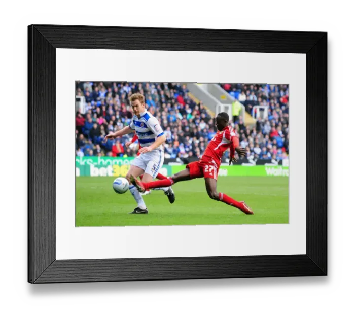 Framed Print : Albert Adomah of Bristol City Stretches for the Ball against Alex Pearce of Reading in Championship Match, 2012