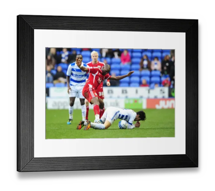 Framed Print : Bristol City's Kalifa Cisse vs. Jem Karacan in Championship Clash at Reading, January 2012