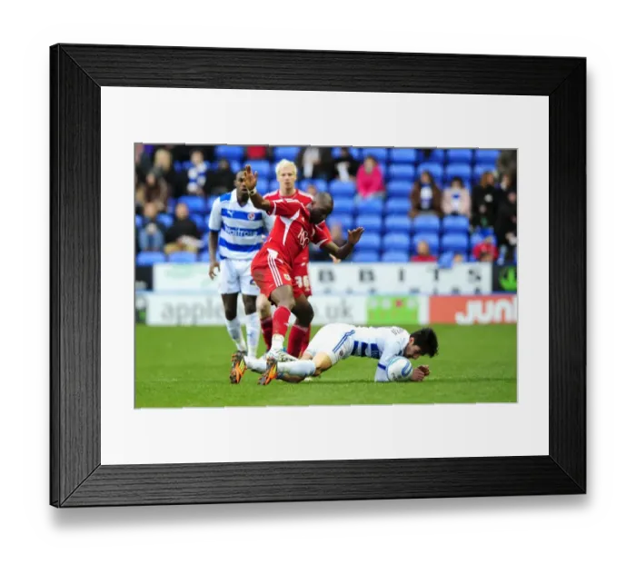 Framed Print : Championship Showdown: Cisse vs. Karacan - Battle for the Ball, Reading v Bristol City, 28 / 01 / 2012