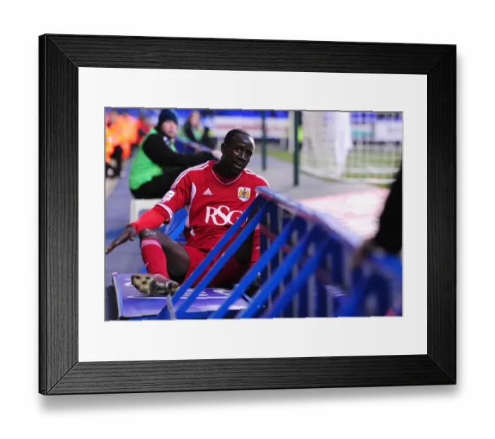 Framed Print : Bristol City's Albert Adomah Takes Dramatic Tumble at Reading's Madejski Stadium, Championship 2012 Framed Print : Bristol City's Albert Adomah Takes Dramatic Tumble at Reading's Madejski Stadium, Championship 2012