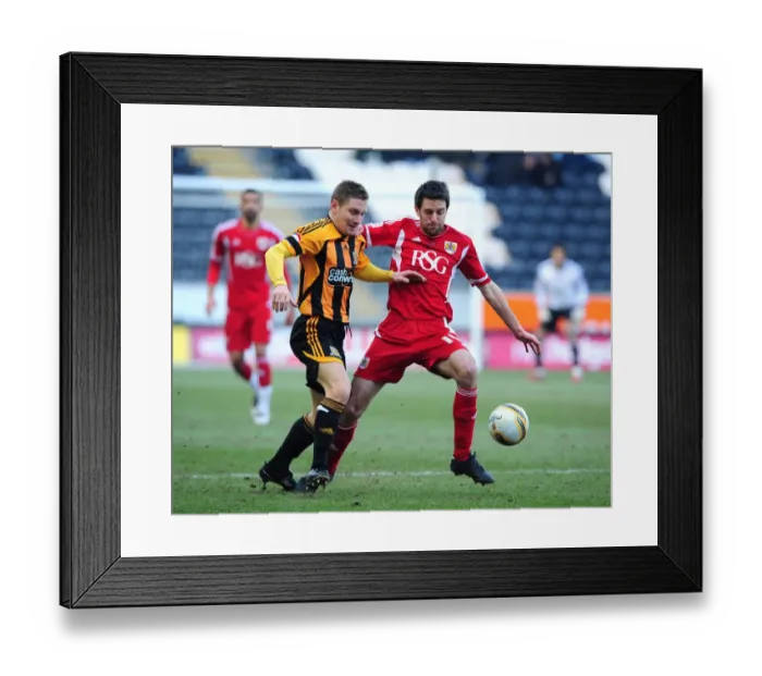 Framed Print : Bristol City's Cole Skuse vs. Hull City's Andy Dawson - Championship Clash at KC Stadium, February 2012