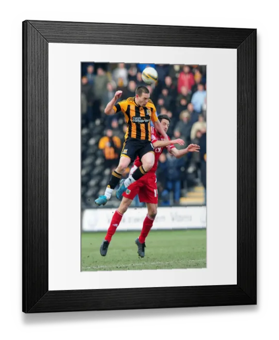 Framed Print : Fryatt vs. Skuse: Battle for Supremacy in Hull City vs. Bristol City Championship Clash - 11 / 02 / 2012
