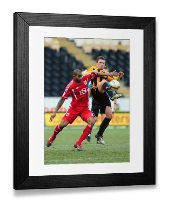 Framed Print : Battling Midfielders: Marvin Elliott of Bristol City and Corry Evans of Hull City Clash in Championship Match, 11 / 02 / 2012 Framed Print : Battling Midfielders: Marvin Elliott of Bristol City and Corry Evans of Hull City Clash in Championship Match, 11 / 02 / 2012