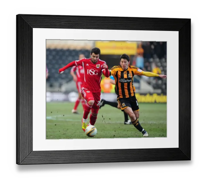 Framed Print : Battling for Supremacy: Foster vs. Koren in Hull City vs. Bristol City Championship Clash - 11 / 02 / 2012