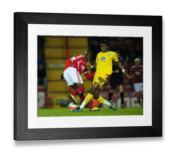 Framed Print : Bolasie vs Zaha: Championship Showdown - Yannick Bolasie of Bristol City and Wilfried Zaha of Crystal Palace Clash in 2012 Framed Print : Bolasie vs Zaha: Championship Showdown - Yannick Bolasie of Bristol City and Wilfried Zaha of Crystal Palace Clash in 2012