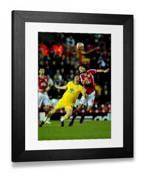 Framed Print : Bristol City's Cole Skuse vs. Chris Martin: Aerial Battle in the Championship Clash between Bristol City and Crystal Palace - 14 / 02 / 2012 Framed Print : Bristol City's Cole Skuse vs. Chris Martin: Aerial Battle in the Championship Clash between Bristol City and Crystal Palace - 14 / 02 / 2012