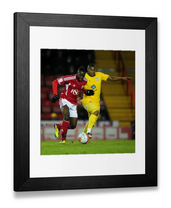 Framed Print : Championship Showdown: Bolasie vs. Dikgacoi - Intense Rivalry Between Bristol City's Yannick Bolasie and Crystal Palace's Kagisho Dikgacoi (14 / 02 / 2012) Framed Print : Championship Showdown: Bolasie vs. Dikgacoi - Intense Rivalry Between Bristol City's Yannick Bolasie and Crystal Palace's Kagisho Dikgacoi (14 / 02 / 2012)