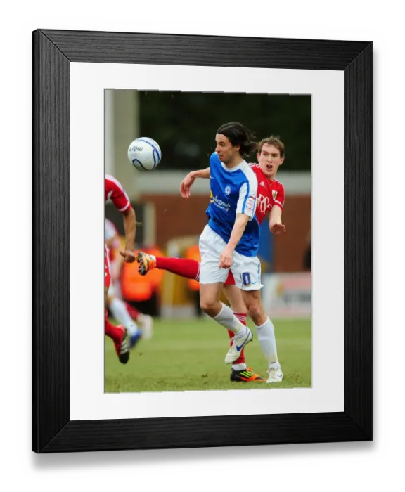 Framed Print : Neil Kilkenny vs George Boyd: Battle for the Ball in Peterborough United vs Bristol City Football Match, 2012