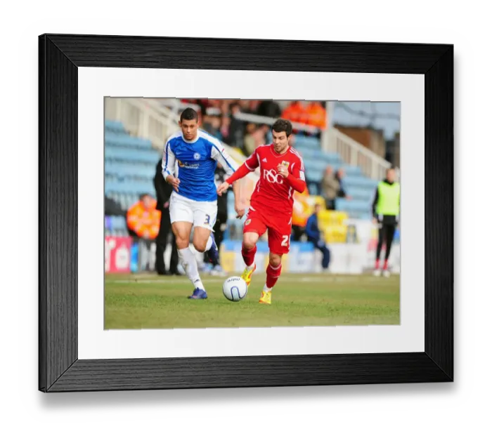 Framed Print : Bristol City's Richard Foster Outsmarts Matthew Briggs in 2012 Football Clash Framed Print : Bristol City's Richard Foster Outsmarts Matthew Briggs in 2012 Football Clash