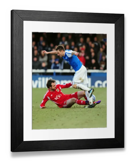 Framed Print : Brett Pitman of Bristol City Tackles Lee Frecklington of Peterborough United during the Football Match Framed Print : Brett Pitman of Bristol City Tackles Lee Frecklington of Peterborough United during the Football Match