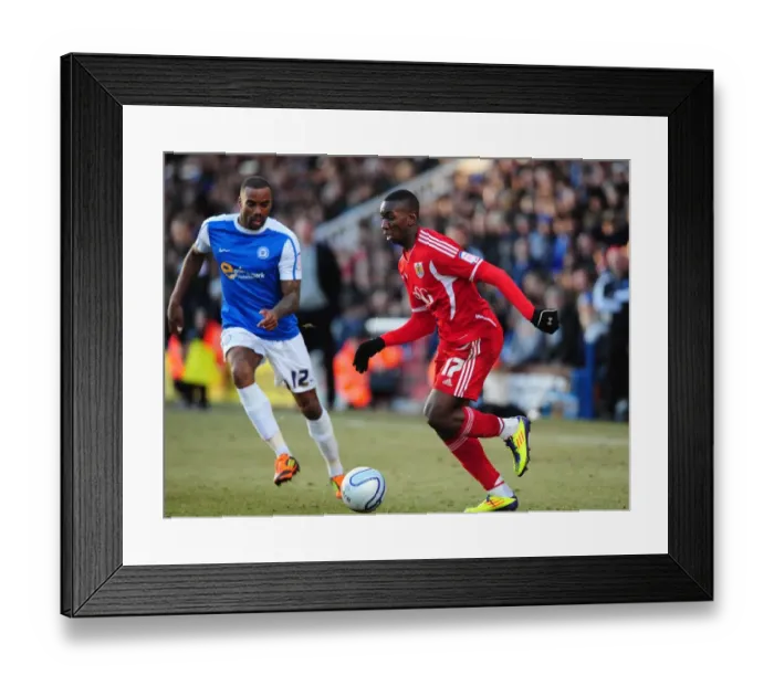 Framed Print : Yannick Bolasie in Action: Peterborough United vs. Bristol City Football Match, 2012 Framed Print : Yannick Bolasie in Action: Peterborough United vs. Bristol City Football Match, 2012
