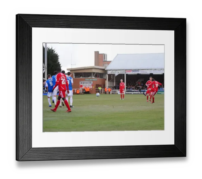 Framed Print : Brett Pitman's Fruitless Free-Kick at Peterborough United, 2012 Framed Print : Brett Pitman's Fruitless Free-Kick at Peterborough United, 2012