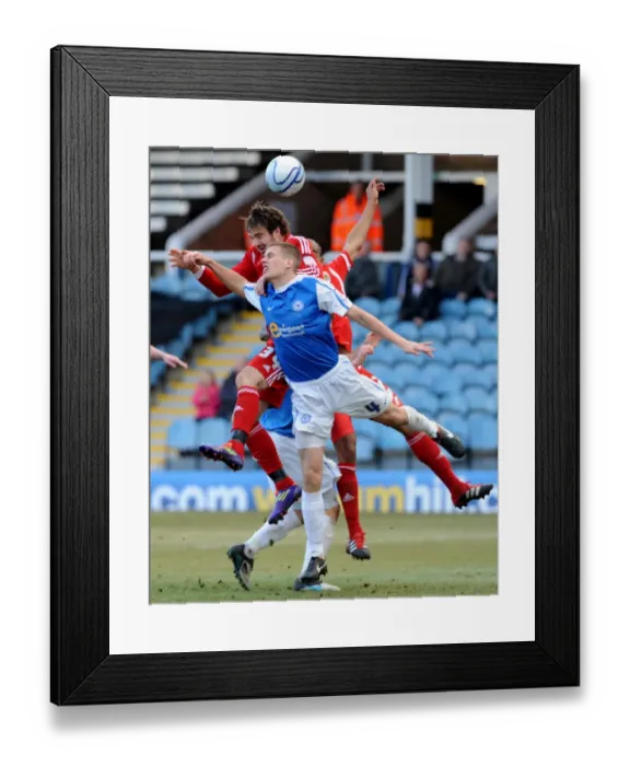 Framed Print : Battling for Supremacy: Pitman vs. Bennett in Peterborough United vs. Bristol City Football Clash Framed Print : Battling for Supremacy: Pitman vs. Bennett in Peterborough United vs. Bristol City Football Clash