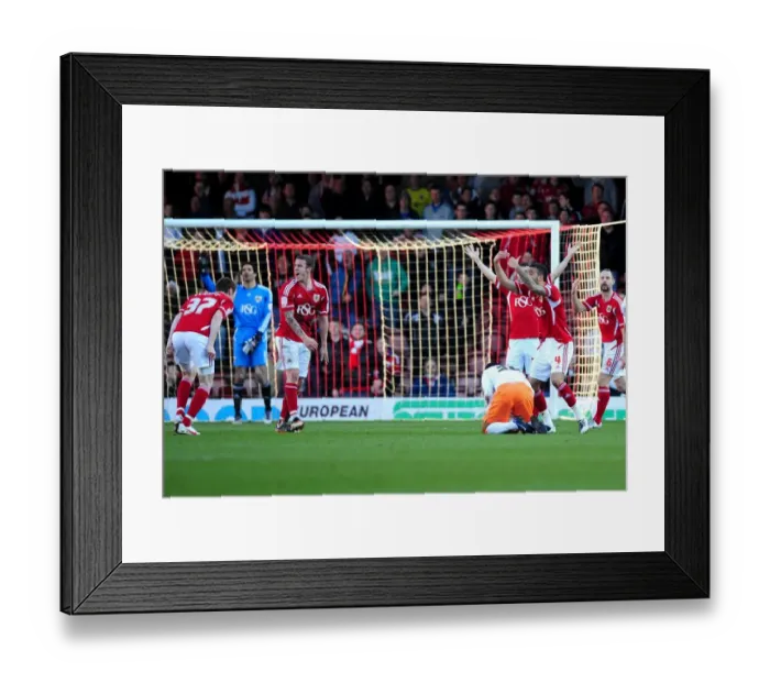 Framed Print : Disbelief: Free Kick Surprise for Bristol City Players against Blackpool (25-02-2012) Framed Print : Disbelief: Free Kick Surprise for Bristol City Players against Blackpool (25-02-2012)