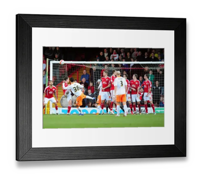Framed Print : Thomas Ince's Free Kick for Blackpool at Ashton Gate Stadium, 2012 Framed Print : Thomas Ince's Free Kick for Blackpool at Ashton Gate Stadium, 2012