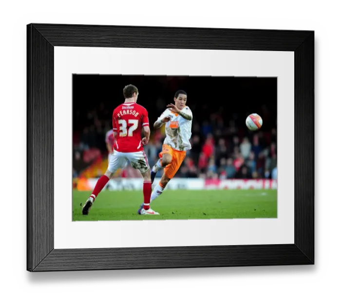 Framed Print : Bristol City vs Blackpool: Intense Battle Between Thomas Ince and Stephen Pearson Framed Print : Bristol City vs Blackpool: Intense Battle Between Thomas Ince and Stephen Pearson