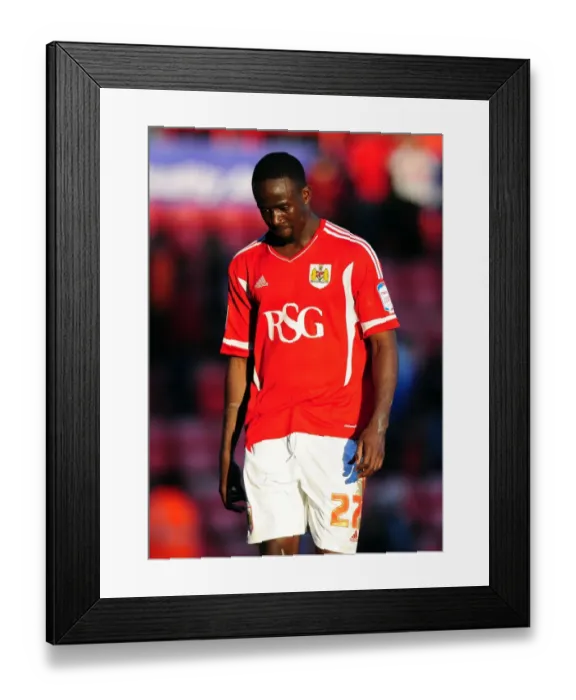 Framed Print : Dejected Albert Adomah Leaves Ashton Gate After Bristol City Loss to Blackpool Framed Print : Dejected Albert Adomah Leaves Ashton Gate After Bristol City Loss to Blackpool