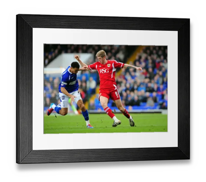 Framed Print : Battling for Supremacy: Jon Stead vs. Carlos Edwards in Ipswich Town vs. Bristol City Football Match, March 2012 Framed Print : Battling for Supremacy: Jon Stead vs. Carlos Edwards in Ipswich Town vs. Bristol City Football Match, March 2012
