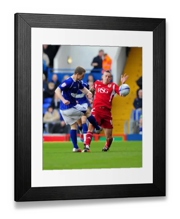 Framed Print : Ipswich Town vs. Bristol City: A Battle for Supremacy - Grant Leadbitter vs. Sean Davis