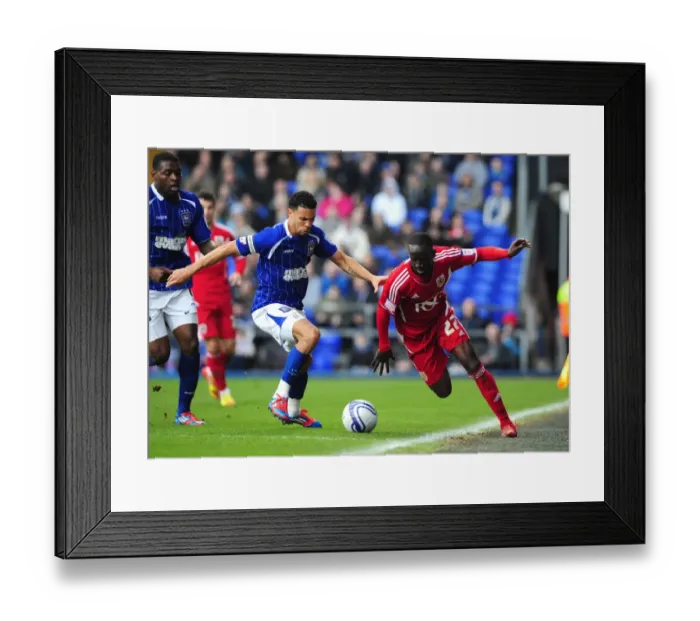 Framed Print : Adomah vs Edwards: Intense Battle for Ball Possession during Ipswich Town vs Bristol City Football Match, Portman Road, 2012 Framed Print : Adomah vs Edwards: Intense Battle for Ball Possession during Ipswich Town vs Bristol City Football Match, Portman Road, 2012
