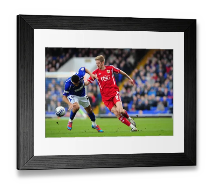Framed Print : Battling for Control: Stead vs. Edwards in the March 2012 Ipswich Town vs. Bristol City Football Match Framed Print : Battling for Control: Stead vs. Edwards in the March 2012 Ipswich Town vs. Bristol City Football Match