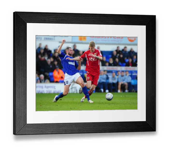 Framed Print : Battling for Control: Stead vs. Delaney in the Intense Ipswich Town vs. Bristol City Clash Framed Print : Battling for Control: Stead vs. Delaney in the Intense Ipswich Town vs. Bristol City Clash