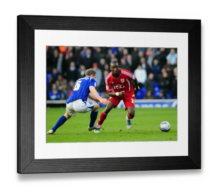 Framed Print : Intense Rivalry: Cisse vs Leadbitter in the Heart of the Football Battle at Portman Road, 2012 Framed Print : Intense Rivalry: Cisse vs Leadbitter in the Heart of the Football Battle at Portman Road, 2012