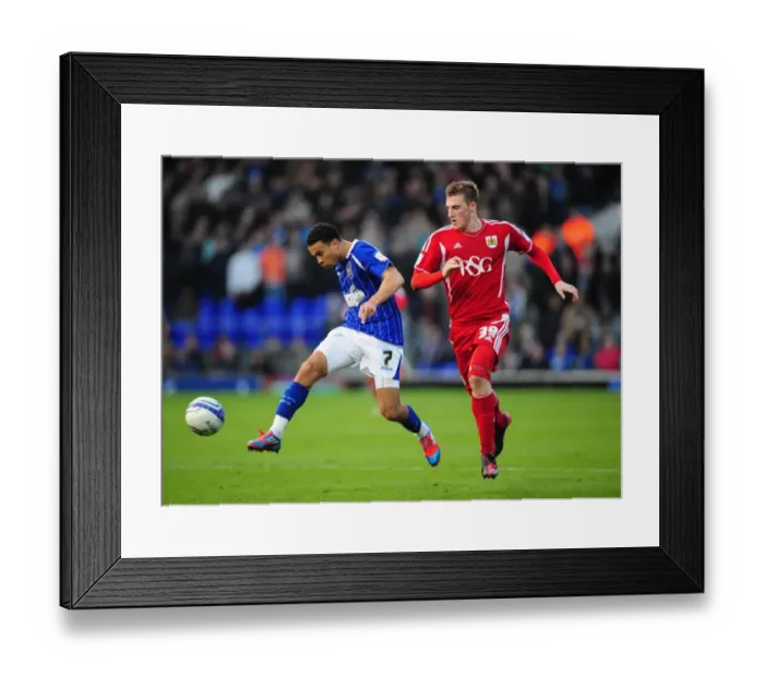 Framed Print : Ipswich Town's Carlos Edwards Outmuscles Bristol City's Chris Wood in March 2012 Clash at Portman Road Framed Print : Ipswich Town's Carlos Edwards Outmuscles Bristol City's Chris Wood in March 2012 Clash at Portman Road