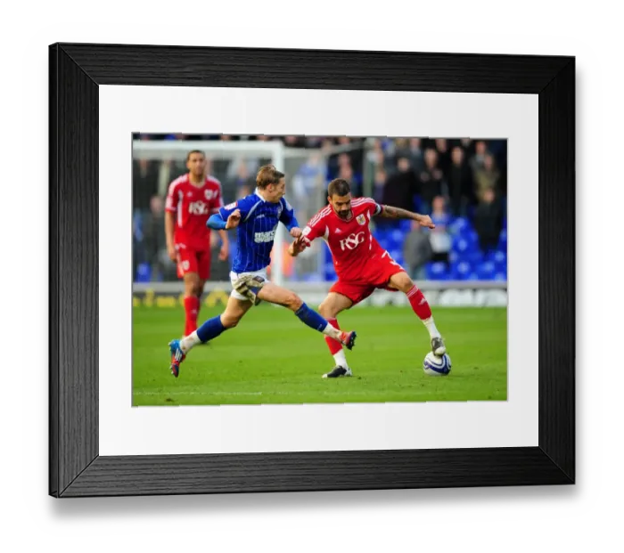 Framed Print : Battling for Supremacy: Liam Fontaine vs. Lee Martin in Ipswich Town vs. Bristol City Football Match, March 2012 Framed Print : Battling for Supremacy: Liam Fontaine vs. Lee Martin in Ipswich Town vs. Bristol City Football Match, March 2012