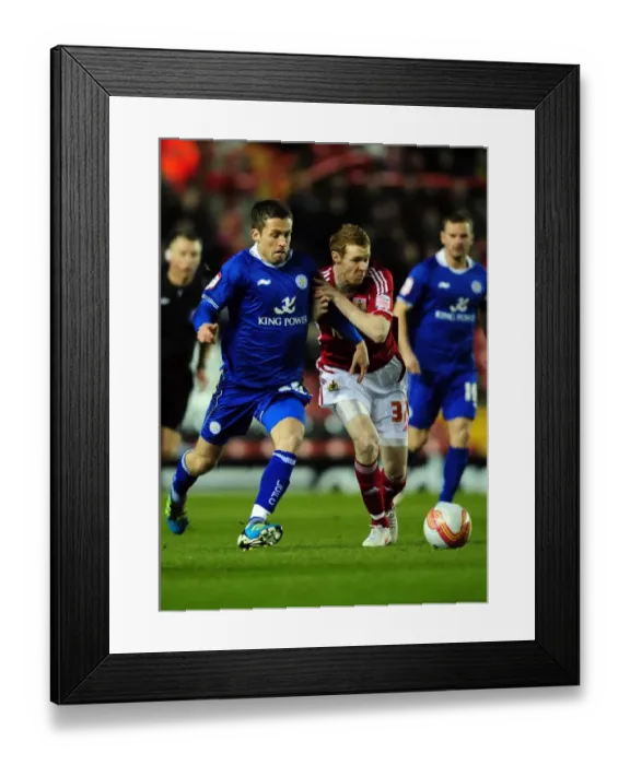 Framed Print : Battling Rivals: Pearson vs. Kennedy in the Intense Bristol City vs. Leicester City Football Clash