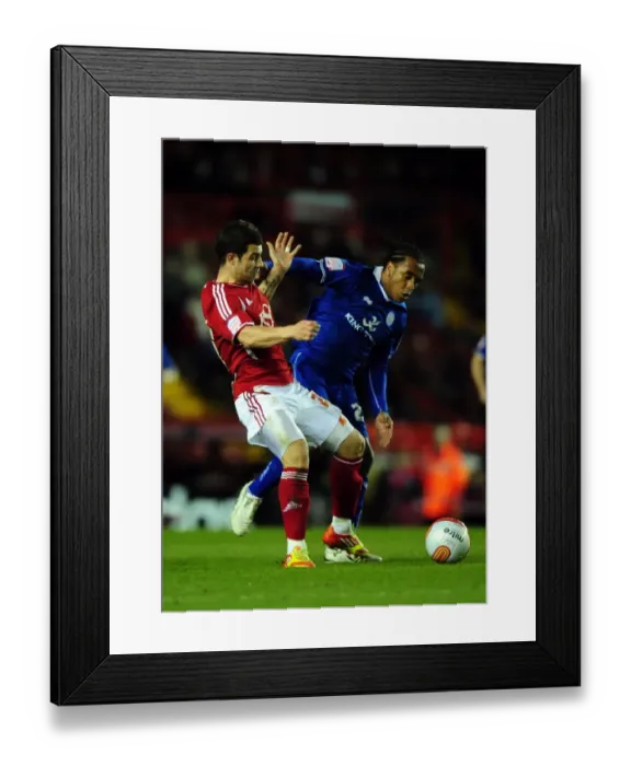 Framed Print : Battling for Control: Foster vs. Danns in the Intense Bristol City vs. Leicester City Football Rivalry