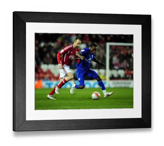 Framed Print : Bristol City vs Leicester City: A Battle for the Ball between Louis Carey and Lloyd Dyer