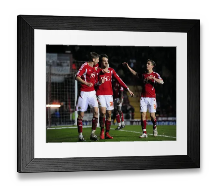 Framed Print : Bristol City Celebrates Victory: Brett Pitman and Team Mates Rejoice After Goal Against Leicester City (Bristol City vs Leicester City, 2012)