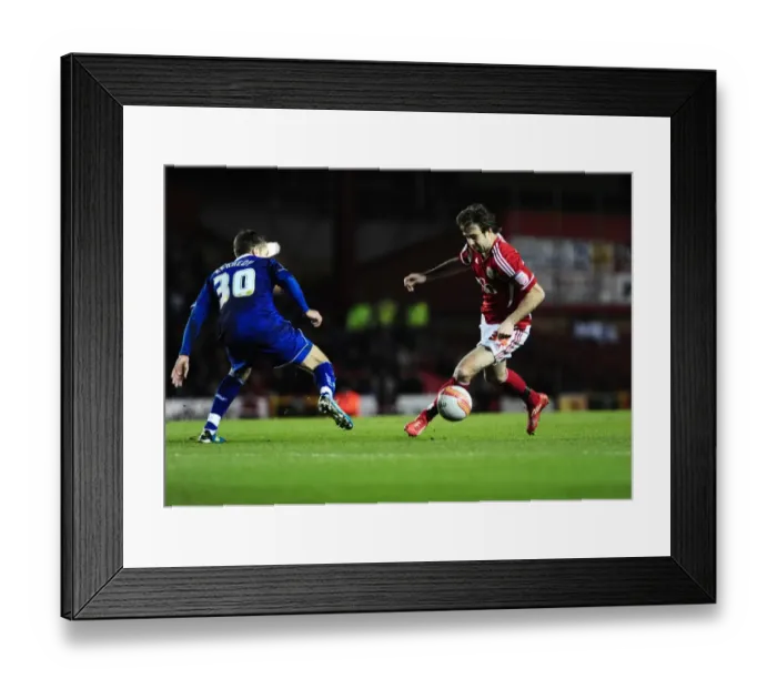 Framed Print : Brett Pitman vs Leicester City: A Fierce Face-off at Ashton Gate Stadium, 2012