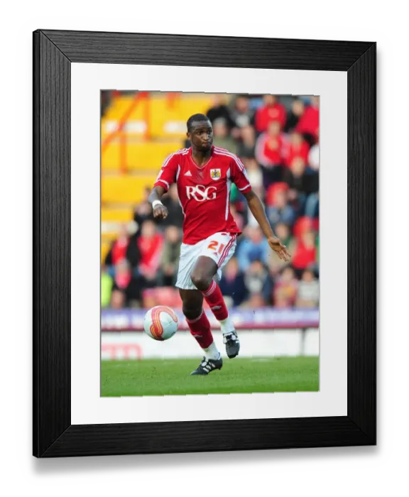 Framed Print : Bristol City's Kalifa Cisse in Action against Cardiff City at Ashton Gate Stadium, 10-03-2012