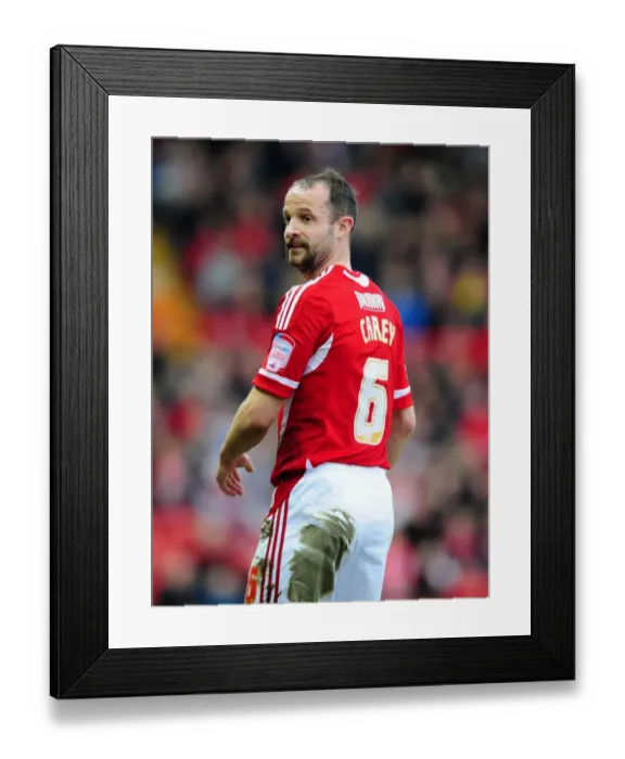 Framed Print : Bristol City's Louis Carey Rallies the Troops: The Intense Rivalry of Bristol City vs. Cardiff City at Ashton Gate Stadium, March 10, 2012 Framed Print : Bristol City's Louis Carey Rallies the Troops: The Intense Rivalry of Bristol City vs. Cardiff City at Ashton Gate Stadium, March 10, 2012