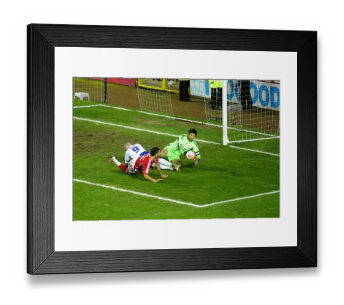 Framed Print : Bristol City's Liam Fontaine Denies Kenny Miller: A Football Rivalry Moment at Ashton Gate Stadium (Bristol City vs. Cardiff City, March 10, 2012)