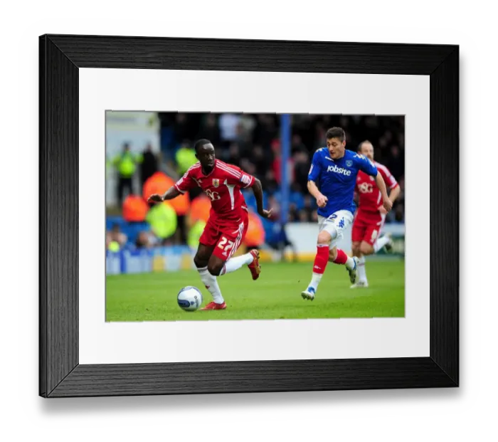 Framed Print : Adomah Evades Ward: Portsmouth vs. Bristol City Football Rumble (17-03-2012) Framed Print : Adomah Evades Ward: Portsmouth vs. Bristol City Football Rumble (17-03-2012)