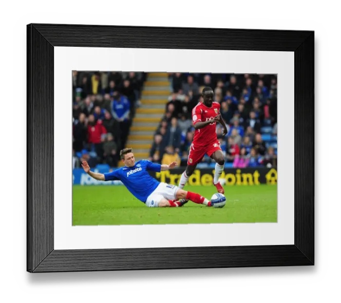 Framed Print : Avoiding the Tackle: Albert Adomah Evades Scott Allan in Portsmouth vs. Bristol City Clash Framed Print : Avoiding the Tackle: Albert Adomah Evades Scott Allan in Portsmouth vs. Bristol City Clash