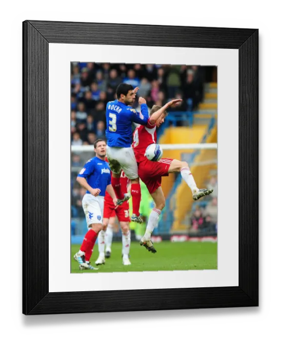 Framed Print : Rocha vs Stead: Aerial Battle at Fratton Park - Portsmouth vs Bristol City Football Match, March 17, 2012 Framed Print : Rocha vs Stead: Aerial Battle at Fratton Park - Portsmouth vs Bristol City Football Match, March 17, 2012