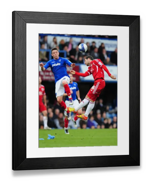 Framed Print : Battling for Supremacy: Foster vs. Allan in Portsmouth vs. Bristol City Clash