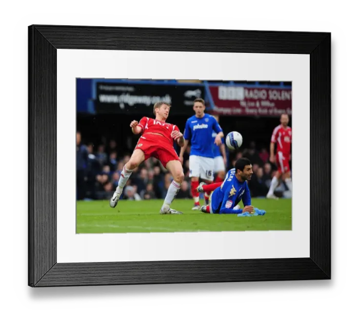 Framed Print : Bristol City's Jon Stead vs. Portsmouth's Ricardo Rocha: A Battle for the Ball at Fratton Park, 2012