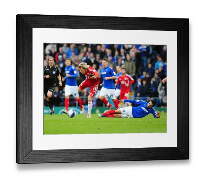 Framed Print : Bristol City's Martyn Woolford Fouled by Ricardo Rocha during Portsmouth vs. Bristol City Football Match, 2012 Framed Print : Bristol City's Martyn Woolford Fouled by Ricardo Rocha during Portsmouth vs. Bristol City Football Match, 2012