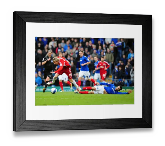 Framed Print : Bristol City's Martyn Woolford Fouled by Portsmouth's Ricardo Rocha During Match, Fratton Park, 2012 Framed Print : Bristol City's Martyn Woolford Fouled by Portsmouth's Ricardo Rocha During Match, Fratton Park, 2012