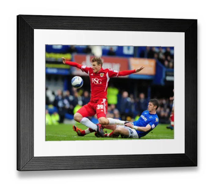 Framed Print : Chris Wood Fouled by Greg Halford during Portsmouth vs. Bristol City Football Match, 17th March 2012